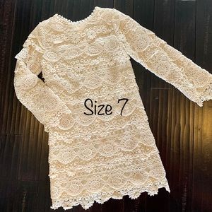 Beautiful girl’s tiered crochet dress